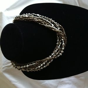 Premier multi strand necklace in copper and matte silver.